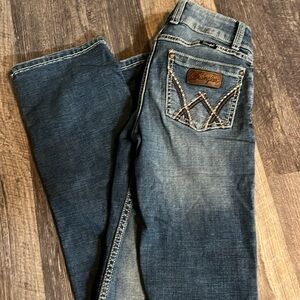 Mid-wash bootcut wrangler jeans